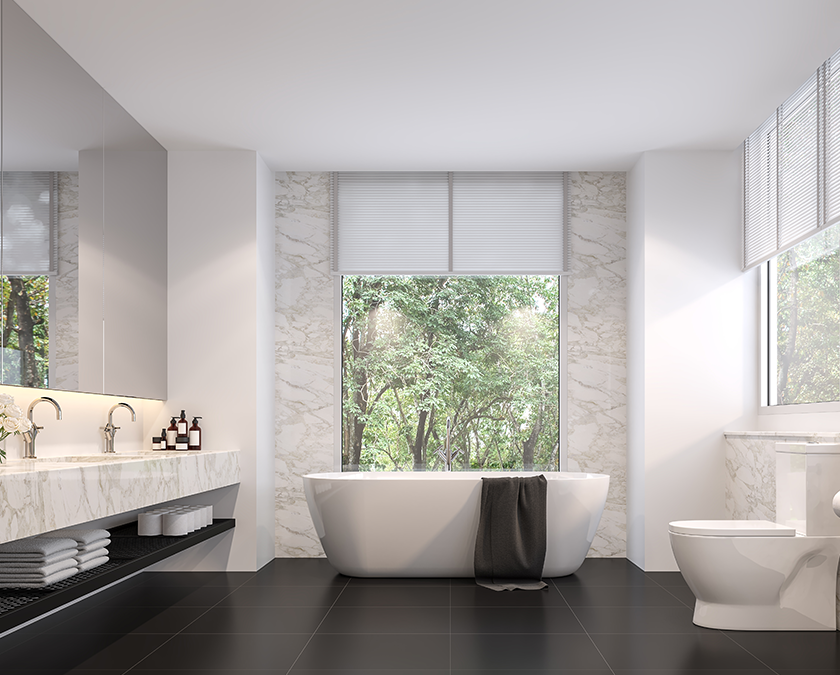 Natural stone bathroom with large windows