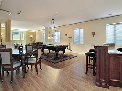 Basement with pool table and bar area