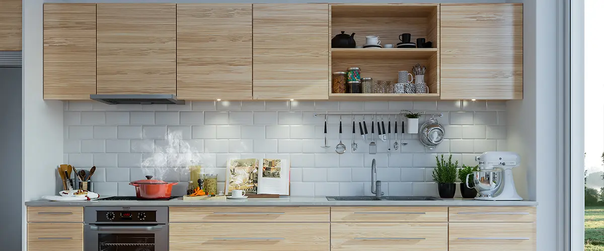 Modern wood cabinets with no hardware on upper cabinets