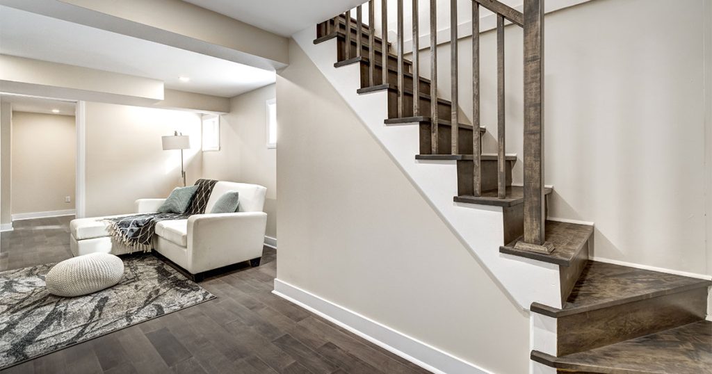 A basement renovation in Northern Virginia with wood flooring and stairs