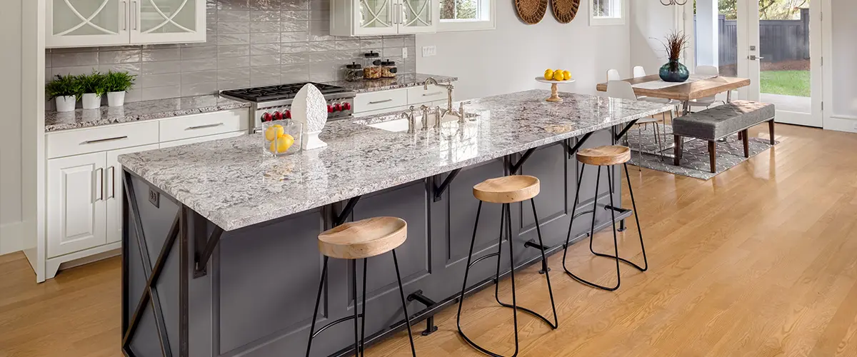 A kitchen remodel with a granite countertop