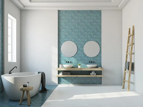 A bathroom with blue tile backsplash