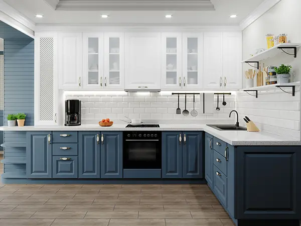 Blue base cabinets in a kitchen with tile flooring