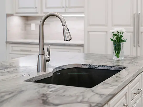 Quartz countertop with a silver faucet