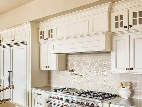 White transitional cabinets in kitchen