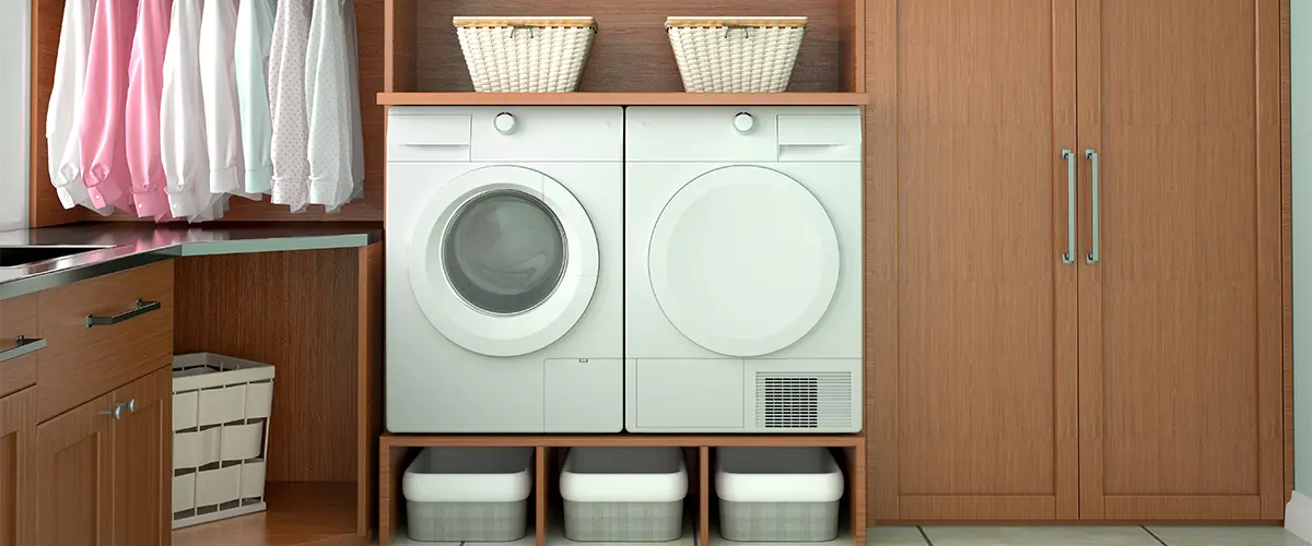 A laundry room with cabinets