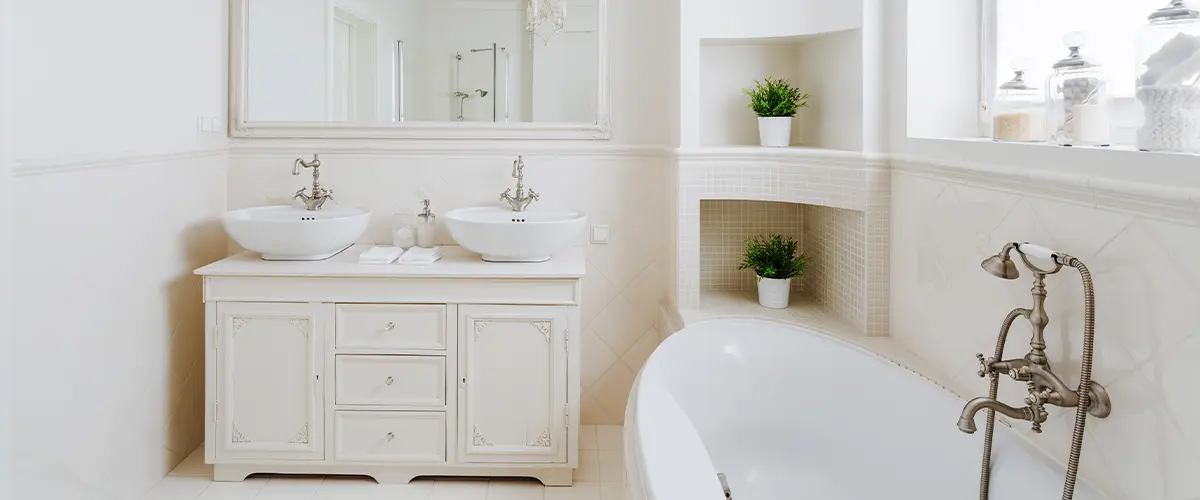 Simple, decorative vanity with small tile flooring and walls