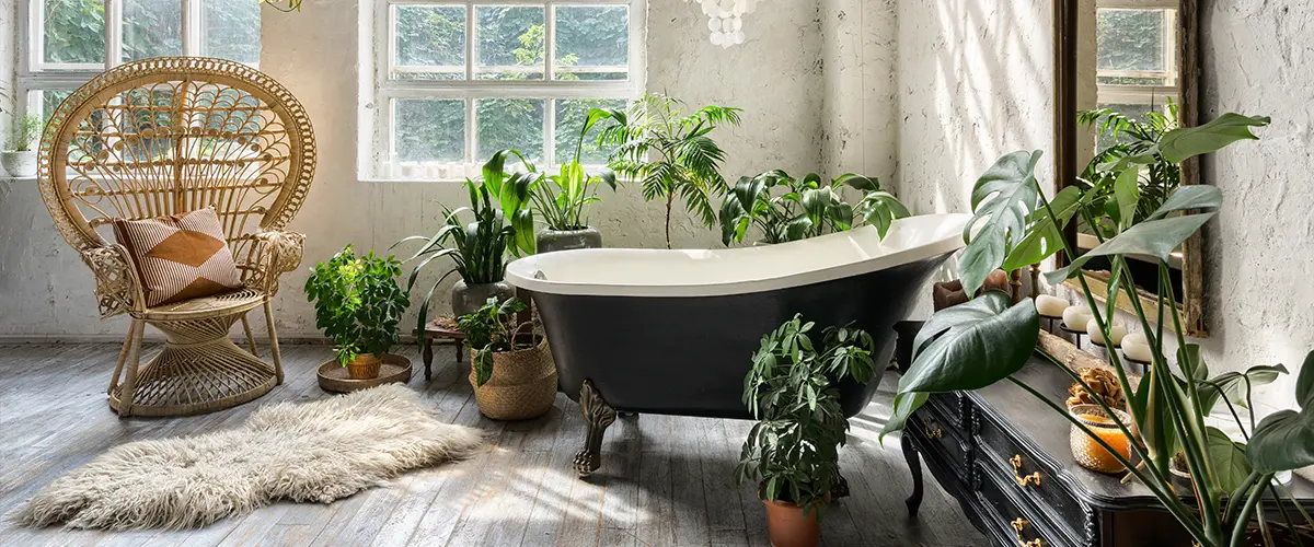 Freestanding tub with a lot of plants