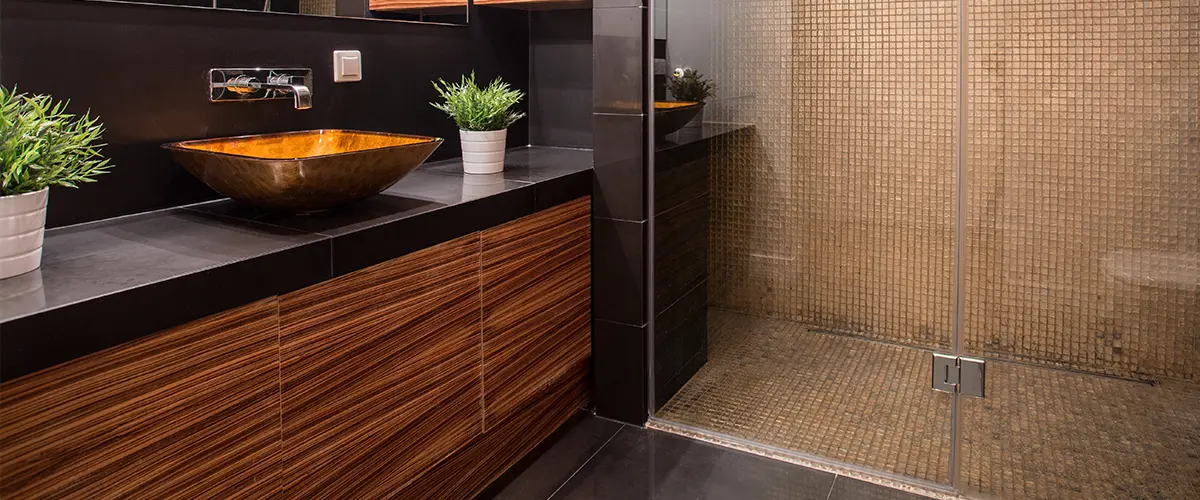 Shining hardwood vanity with a walk in shower