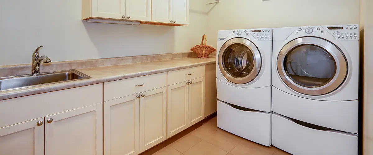 A laundry room in a basement room