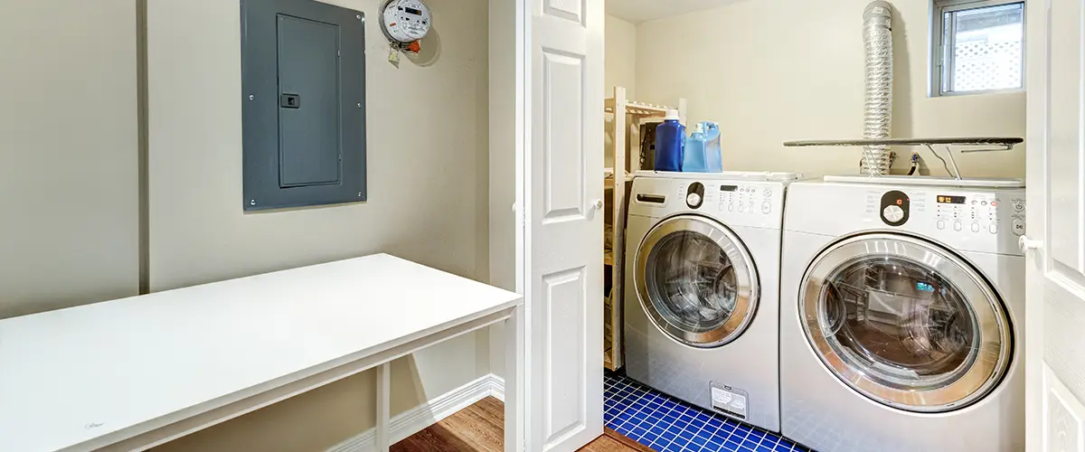A laundry room in a basement